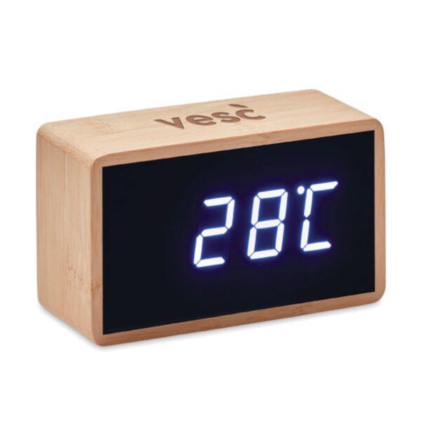 Gadget with logo Alarm clock MIRI Gadget with logo white LED time display alarm clock and temperature display in bamboo casing. AC-DC 2 pin plug adapter included. Not suitable for UK use. Bamboo is a natural product, there may be slight variations in colour and size per item. Depending on the surface we can use embroidery, engraving, 360° imprint or screen print.