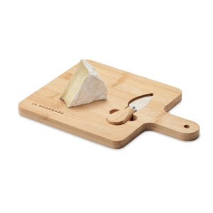 Gadget with logo Cheese board set DARFIELD Bamboo Cheese set serving board with serving knife. Present your guests with some cheese or other types of food and snacks on this woodenplatter. It has a handle for easy carrying. The hole in the handle canbe used to hang the serving board when not in use. Bamboo is a naturalproduct, there may be slight variations in colour and size per item,which can affect the final decoration outcome. Available color: Wood Dimensions: 27.5X19.5X1CM Width: 19.5 cm Length: 27.5 cm Height: 1 cm Volume: 1.8 cdm3 Gross Weight: 0.52 kg Net Weight: 0.44 kg Magnus Business Gifts is your partner for merchandising, gadgets or unique business gifts since 1967. Certified with Ecovadis gold!