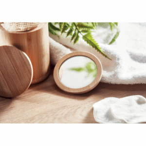 Gadget with logo Mirror MALAY Rounded bamboo single-sided make up mirror with logo. Presented in cotton drawcord pouch. This small mirror is ideal to keep on you to apply your make-up or quickly do a check of how you are looking. Bamboo is anatural product, there may be slight variations in colour and size peritem, which can affect the final decoration outcome. Available color: Wood Dimensions: 12X8CM Width: 8 cm Length: 12 cm Volume: 0.1 cdm3 Gross Weight: 0.025 kg Net Weight: 0.021 kg Magnus Business Gifts is your partner for merchandising, gadgets or unique business gifts since 1967. Certified with Ecovadis gold!