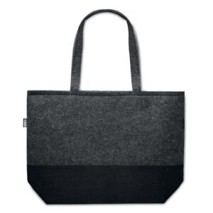 Tote bag with logo DUO INDICO Tote bag with logo in RPET RPET felt shopping bag with long handles and colored base. Depending on the surface we can use embroidery, engraving, 360° imprint or screen print. Magnus Business Gifts anticipated on what society expects today: focus on corporate social respons