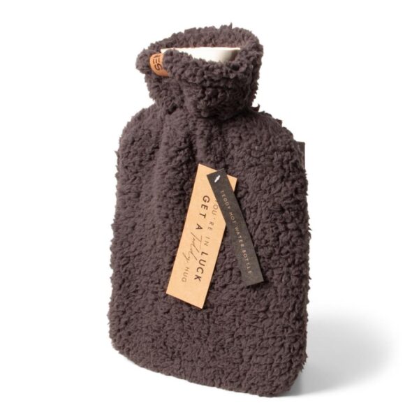 Hot water bottle Teddy in polyester with soft cover in RPET Polybag + Hangtag. Turn chilly nights at home toasty, with our hot water bottles. Also ideal for for neck, shoulder pain and hand feet warmer, menstrual cramps. Available in black, grey and white. Dimensions 34 x 23 x 8 cm. Magnus Business Gifts is your partner for merchandising, gadgets or unique business gifts since 1967. Certified with Ecovadis gold 2022!