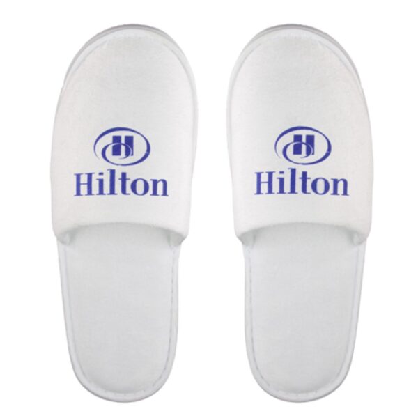 Hotel slippers custom made Step into comfort with our exquisite custom-made slippers that redefine luxury and style. Our artisan-crafted slippers are designed to provide the perfect blend of coziness and elegance, tailored to suit your unique preferences. Choose from a variety of materials and personalize every detail, from color to embroidery, to create a pair that reflects your individual taste. REQUEST A FREE QUOTE The easiest way to kick off your design process is to request a quote. In your request, you can share your idea, your deadline, and send us images of your character. Magnus Business Gifts is your partner for merchandising, gadgets or unique business gifts since 1967. Certified with Ecovadis gold!