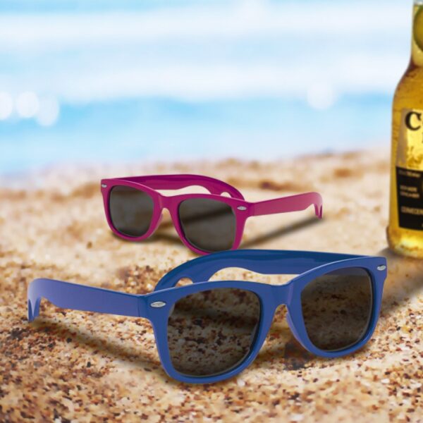 Sunglasses with bottle opener Combining style and functionality like never before, these sunglasses come equipped with a built-in bottle opener, making them the perfect companion for all your sunny adventures. Features: UV Protection: Our sunglasses are equipped with high-quality lenses that provide 100% UV protection, ensuring your eyes stay safe and comfortable in bright conditions. Lightweight and Durable: Constructed from durable materials, these sunglasses are lightweight and comfortable to wear for extended periods, making them ideal for both casual and active use. Customizable: With the option to add your logo or branding to the frames, these sunglasses can be personalized to promote your brand or organization while showing your support for Team Belgium. Whether you're soaking up the sun at the beach, chilling by the pool, or hitting up a summer festival, these sunglasses will keep you looking cool and feeling prepared for whatever the day brings. REQUEST A FREE QUOTE The easiest way to kick off your design process is to request a quote. In your request, you can share your idea, your deadline, and send us images of your character. MOQ required. Magnus Business Gifts is your partner for merchandising, gadgets or unique business gifts since 1967. Certified with Ecovadis gold!