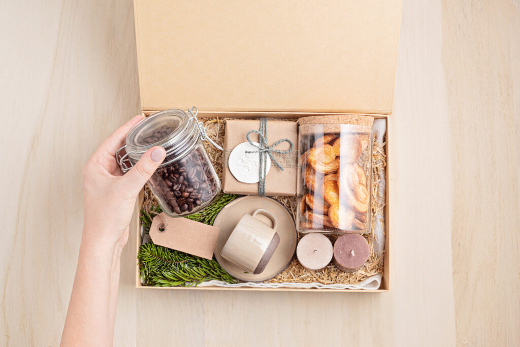 Apéro boxes mix & match MIX & MATCH A ONE-OF-A-KIND EXPERIENCE Apéro boxes and gift boxes that allow you to mix and match items are fantastic options for creating personalized and thoughtful gifts for various occasions. Our gift boxes are designed to be versatile and cater to individual preferences, making them a delightful surprise for the recipients. With an array of gourmet delicacies and carefully curated items, our gift boxes transcends the ordinary and fosters a sense of unity among colleagues. As employees indulge in the apéro experience, they’ll create lasting memories and be inspired to continue striving for excellence within the organization. Ask our team now what you can do with your budget. Why apéro boxes and mix-and-match gift boxes are so appealing: Apéro Boxes: Elevated Social Experience: Apéro (short for apéritif) is a French tradition of enjoying a pre-dinner drink and light snacks with friends and family. Apéro boxes are curated to create an elevated and enjoyable social experience, providing a variety of gourmet snacks, cheeses, charcuterie, and beverages like wine or champagne. Convenience: Apéro boxes save time and effort as they come pre-arranged with a selection of complementary items. They are ready to be served and enjoyed, perfect for hosting impromptu gatherings or taking to picnics. Taste Exploration: These boxes often include a diverse range of flavors, allowing recipients to explore new tastes and combinations. It’s an excellent way to introduce someone to a variety of delicious treats they may not have tried before. Personalized Selection: While apéro boxes come pre-arranged, some providers offer options to customize the contents to suit individual preferences, dietary restrictions, or the occasion. Mix-and-Match Gift Boxes: Tailored to Recipients: Mix-and-match gift boxes allow you to curate a selection of items based on the interests, hobbies, or preferences of the recipient. It shows that you’ve put thought into creating a gift uniquely suited to them. Flexibility and Variety: The mix-and-match concept offers flexibility, as you can choose from a wide range of products to include in the gift box. It ensures a diverse and varied assortment of items that can cater to different tastes. Suitable for Any Occasion: These gift boxes can be customized for birthdays, holidays, anniversaries, corporate events, or any other special occasion. They’re adaptable to any celebration or gifting situation. Personal Touch: Creating a mix-and-match gift box allows you to add a personal touch by including the recipient’s favorite items or adding a heartfelt note or card. Budget-Friendly: Mix-and-match gift boxes can be tailored to fit your budget. You have control over the number and type of items you include, making it cost-effective while still being thoughtful. Memorable and Appreciated: Recipients often appreciate the effort and creativity put into mix-and-match gift boxes. The uniqueness of the gift and the thought behind it make it a memorable and cherished present. Whether it’s an apéro box for a delightful social gathering or a mix-and-match gift box tailored to the recipient’s preferences, these options allow for personalization and creativity in gifting, making the experience more meaningful and enjoyable for both the giver and the receiver. Printed business gifts for employees worth up to €50 are tax deductible. Magnus Business Gifts is your partner for merchandising, gadgets or unique business gifts to match your company, school or sports organisation.